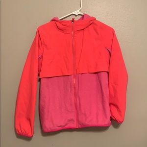 a pink jacket